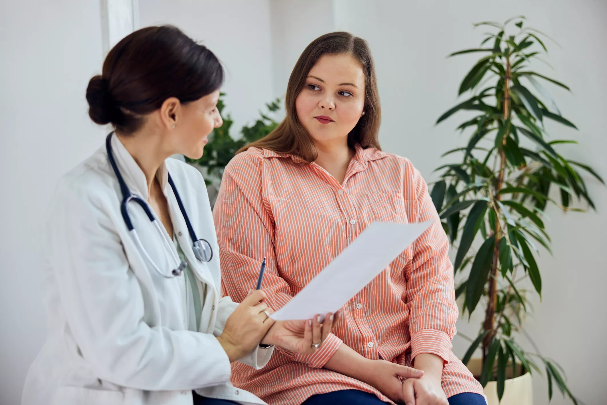 Patient and healthcare provider talking
